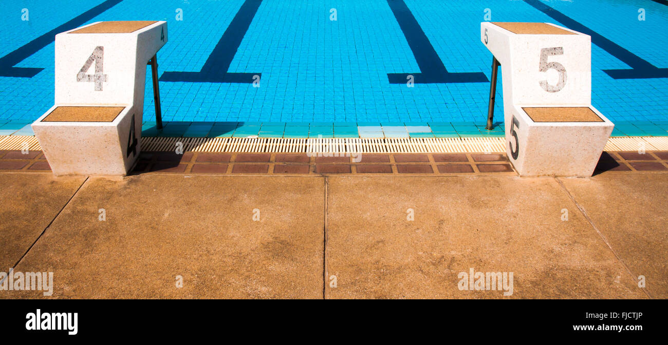 old swiming pool with blue color, lane for race Stock Photo
