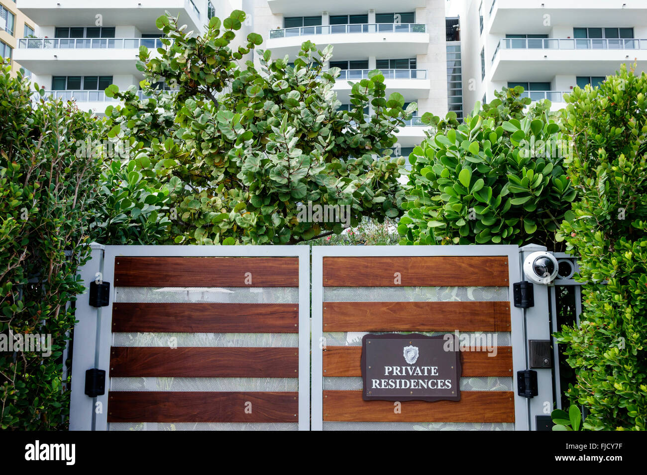 Miami Beach Florida,gate,sign,private residences,property,condominium residential apartment apartments building buildings housing,FL160226035 Stock Photo