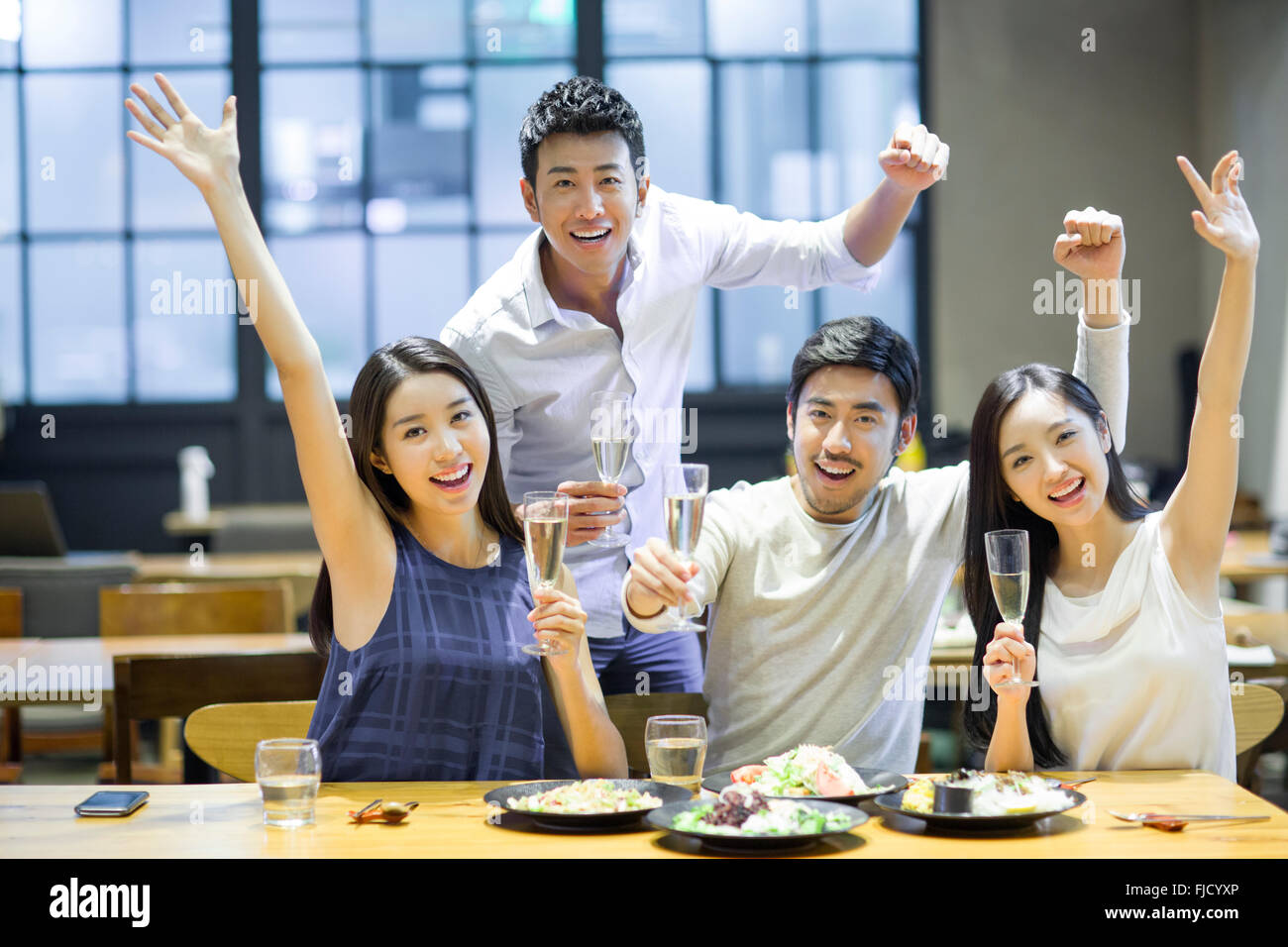 Chinese friends having dinner together Stock Photo - Alamy