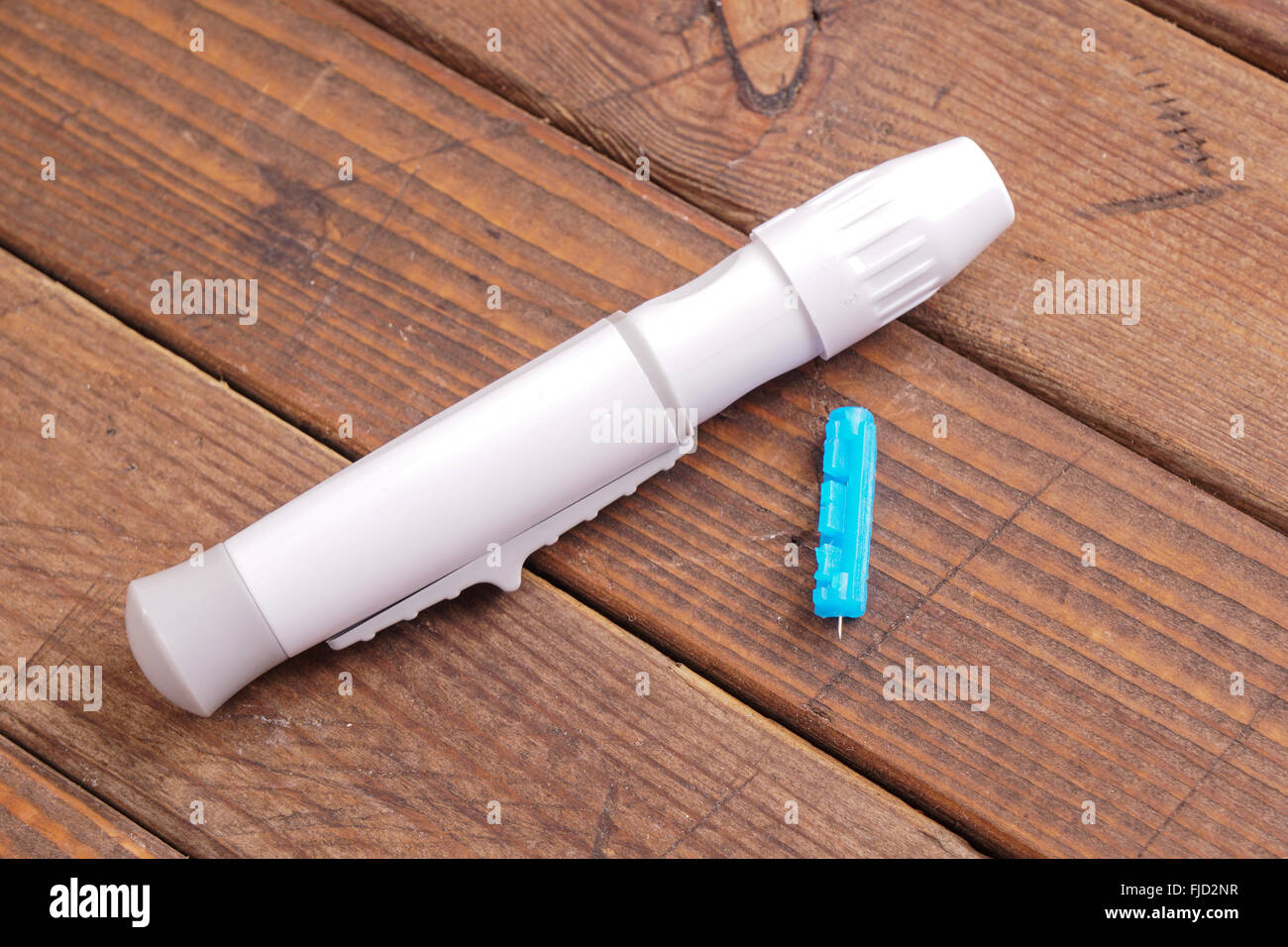 Diabetes lancet for testing the blood sugar and a prick needle Stock