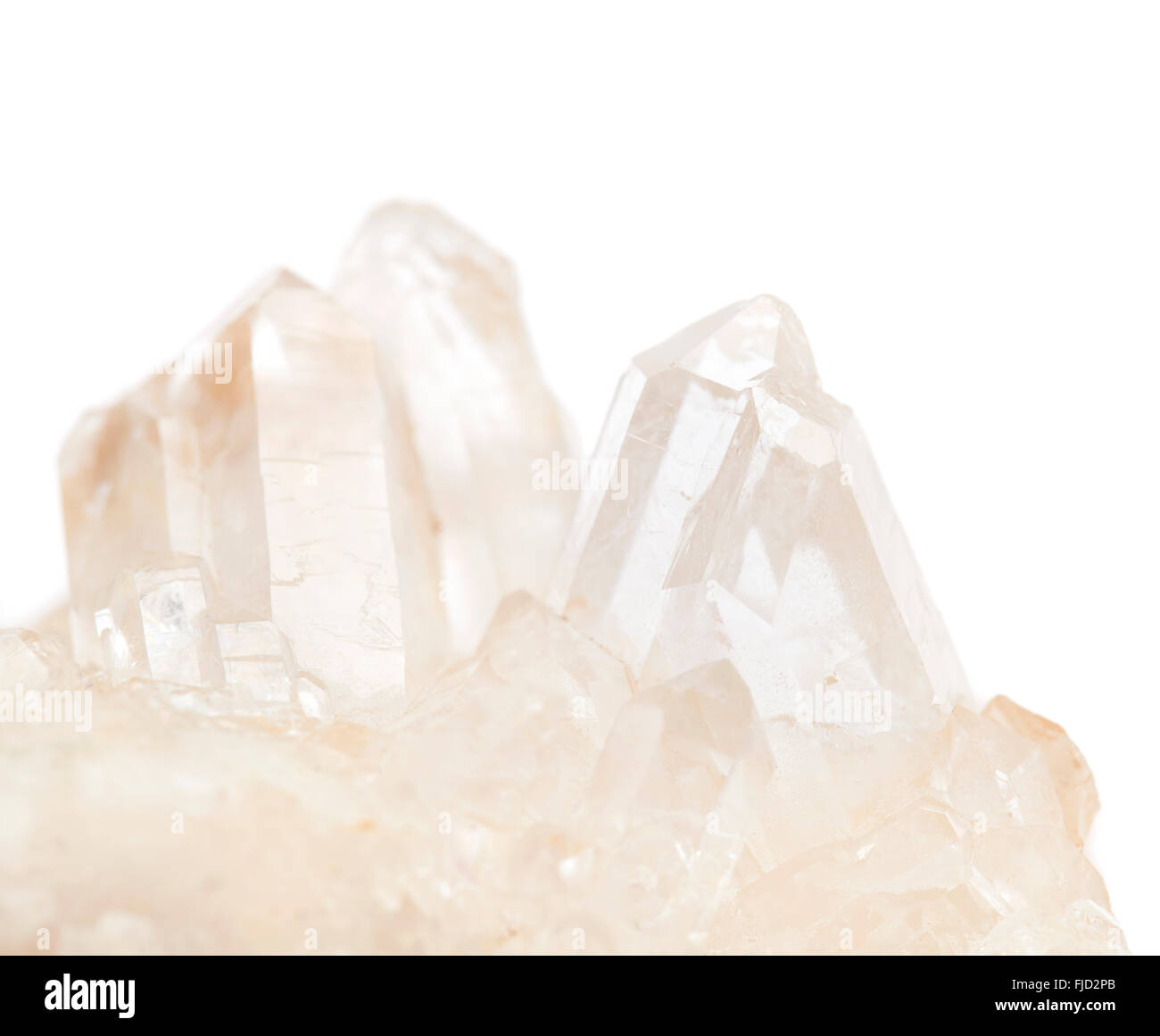 cluster of small quartz crystals isolated on white background Stock