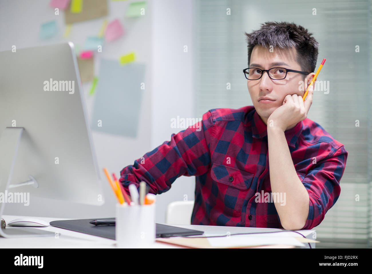 Chinese illustrator thinking Stock Photo Alamy