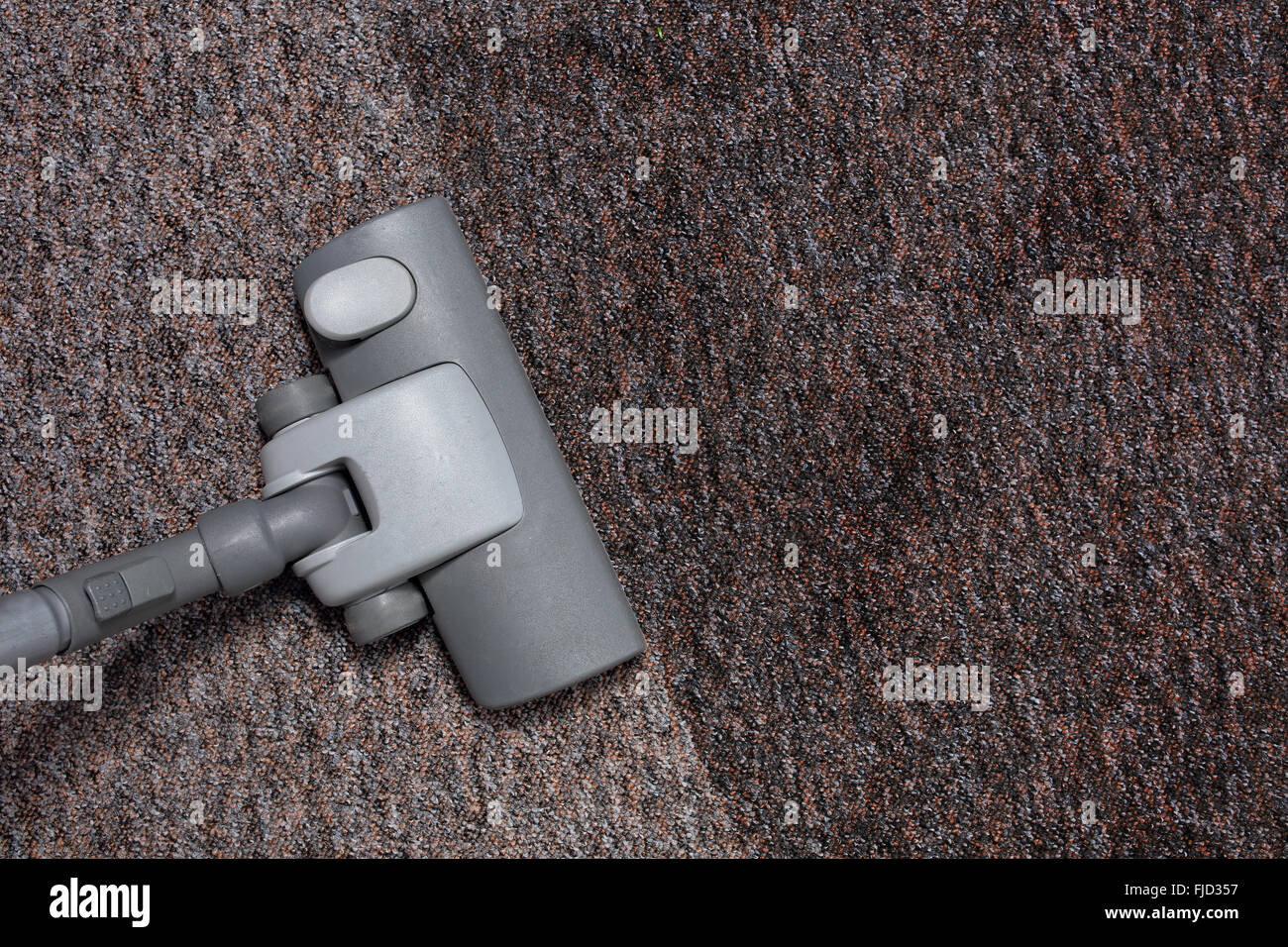 Vacuuming very dirty carpet Stock Photo Alamy