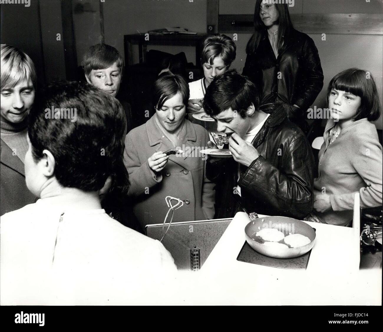 1966 - Softening up the tough guys: Cookery, home management , and beauty culture they are all on the agenda of the Squires Youth Club in the tough Elephant and Castle area of London. And the keenest students of these subjects are the boys. Only a few years ago, teenage boys would have laughed at the idea of learning the social graces but gradually they have taken over these classes which were originally intended for the girls. The area was once notorious for the teenage gangs roaming the streets but now many of the boys are real sing the importance of becoming socially acceptable and in becom Stock Photo