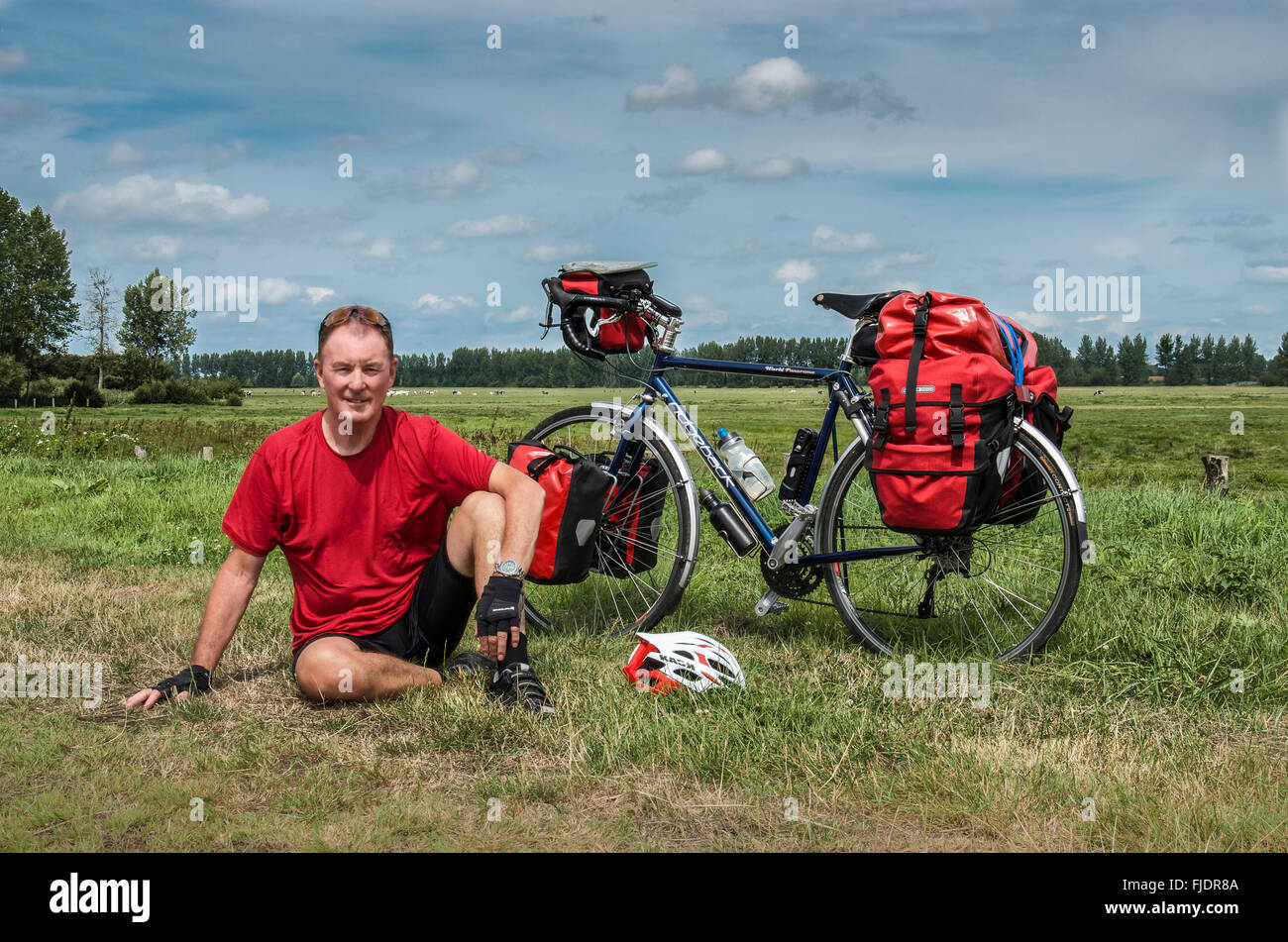 Cycle tourist, on a cycle camping trip in France Stock Photo