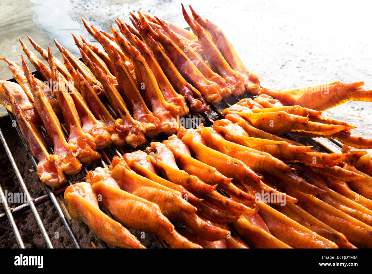 A photo of Chicken wings on the grill Stock Photo