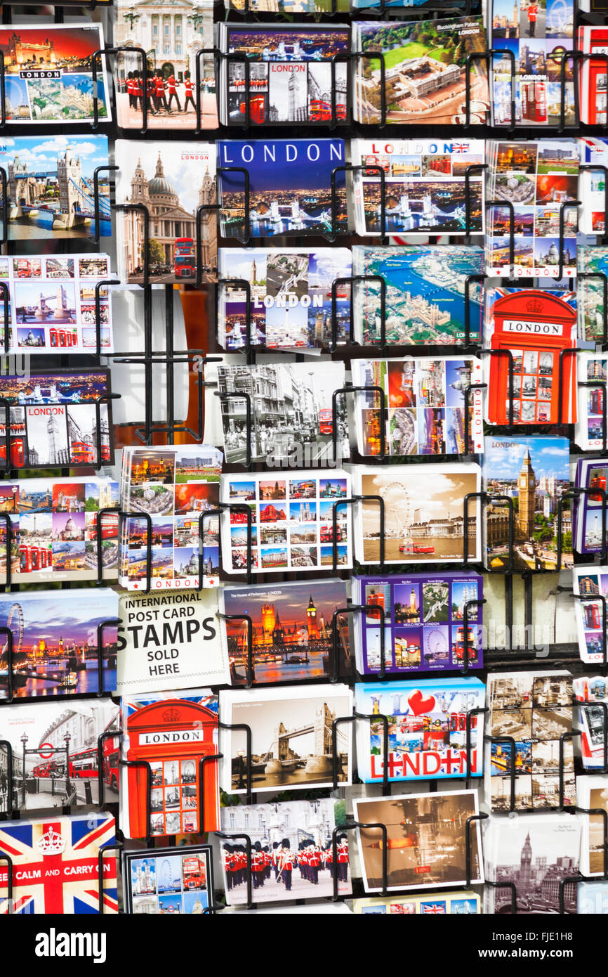 Postcards London souvenirs in rack for sale at Camden Town, London UK