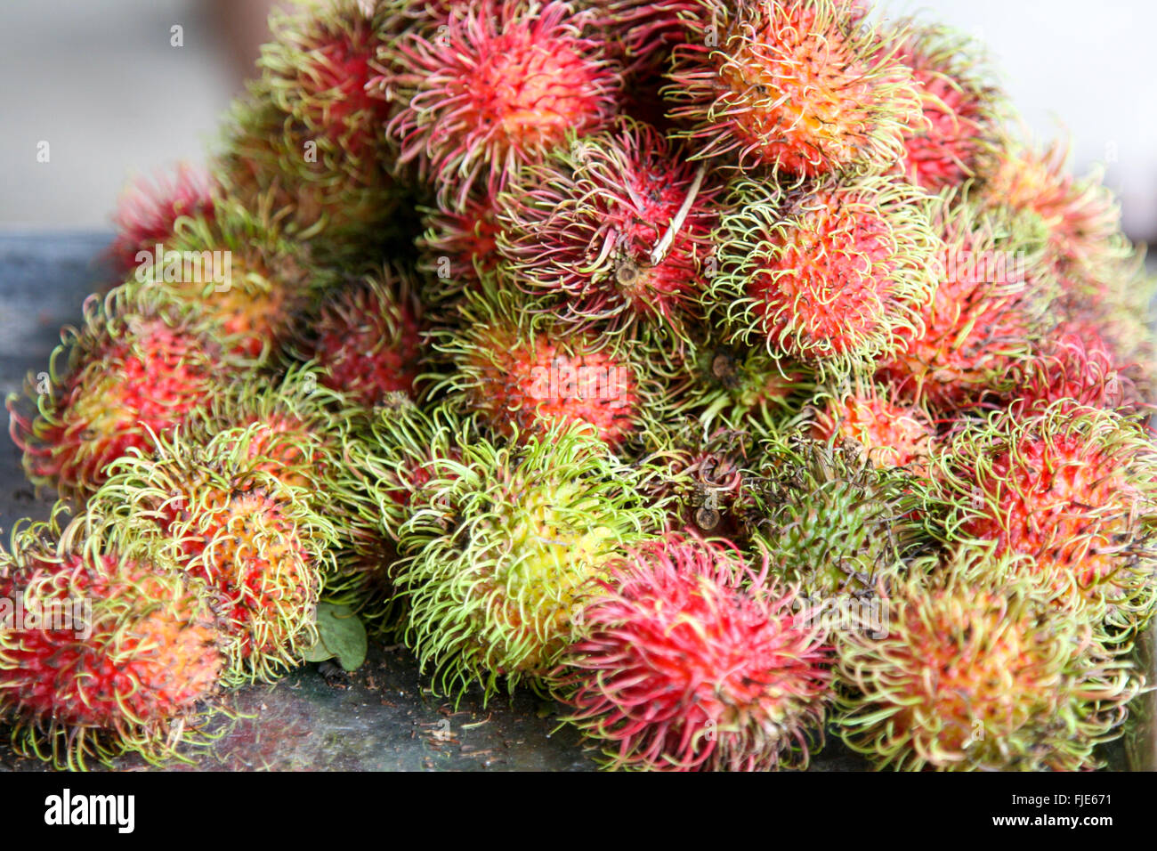 Rambutans at Thai market Stock Photo