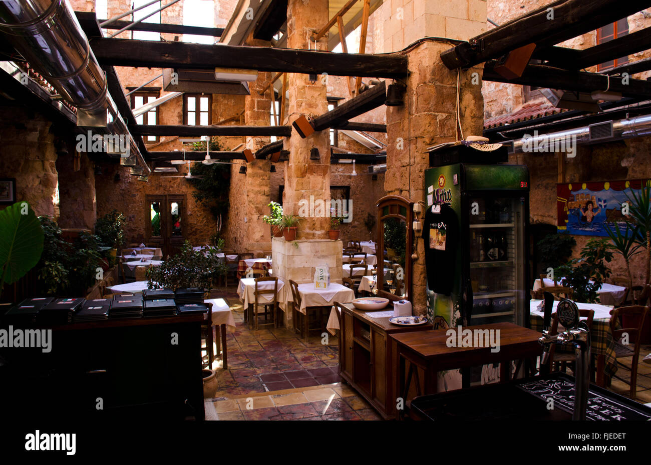 Restaurant in historic building, old town Chania, island Crete, Greece Stock Photo