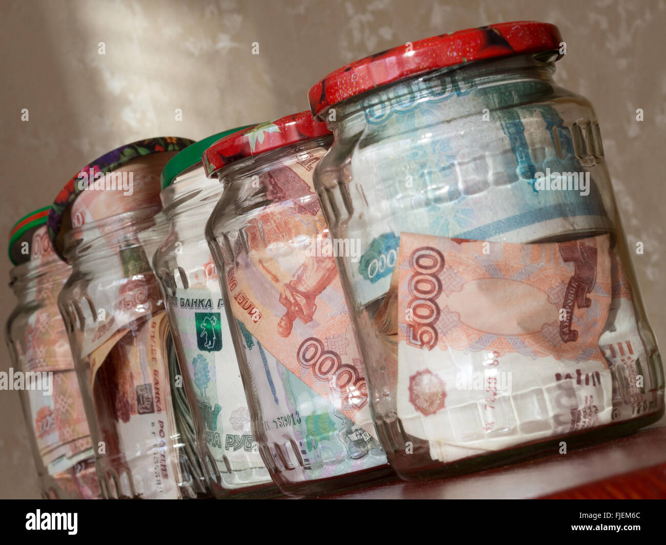 Jars of cash. Glass jars with banknotes Stock Photo Alamy