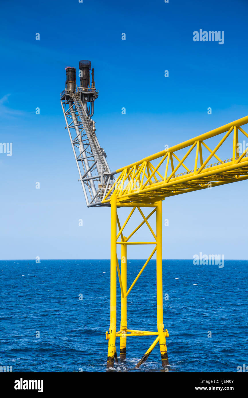 Flare stack of oil and gas processing platform Stock Photo