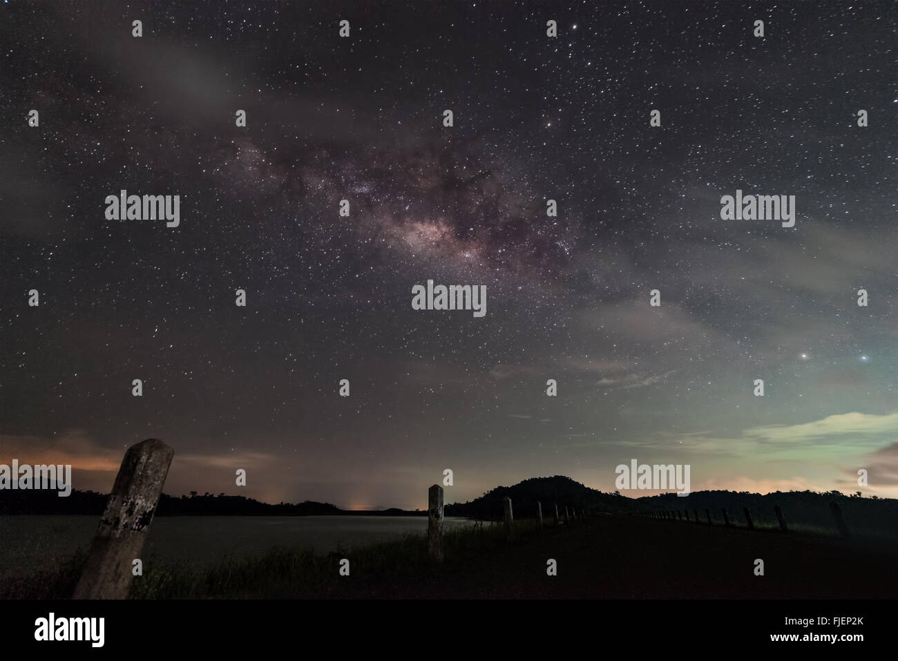 Milky Way Galaxy, Night Sky with on dam Stock Photo