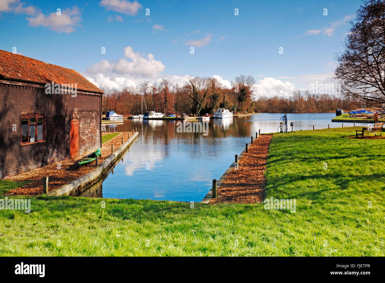 A view of Barton Turf public staithe on the Norfolk Broads, England