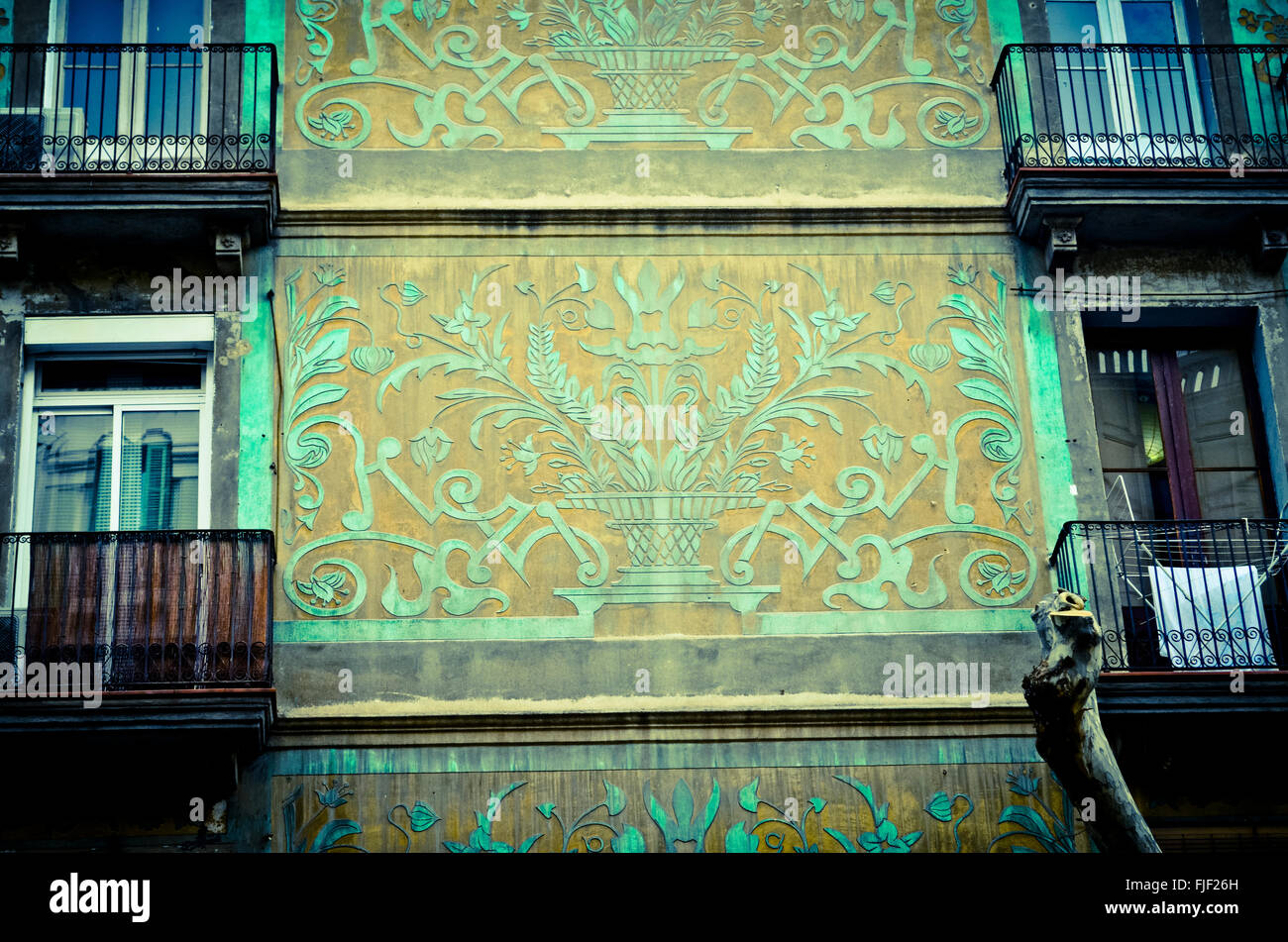 Sgraffito on a facade of a building.. Eixample quarter, Barcelona, Catalonia, Spain. Stock Photo
