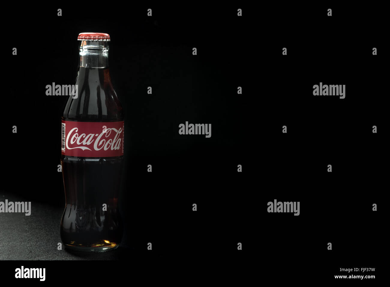 Bangkok, THAILAND February 17: Coca-Cola in a glass bottle on black Background. on 17 February 2016 in Bangkok ,Thailand Stock Photo