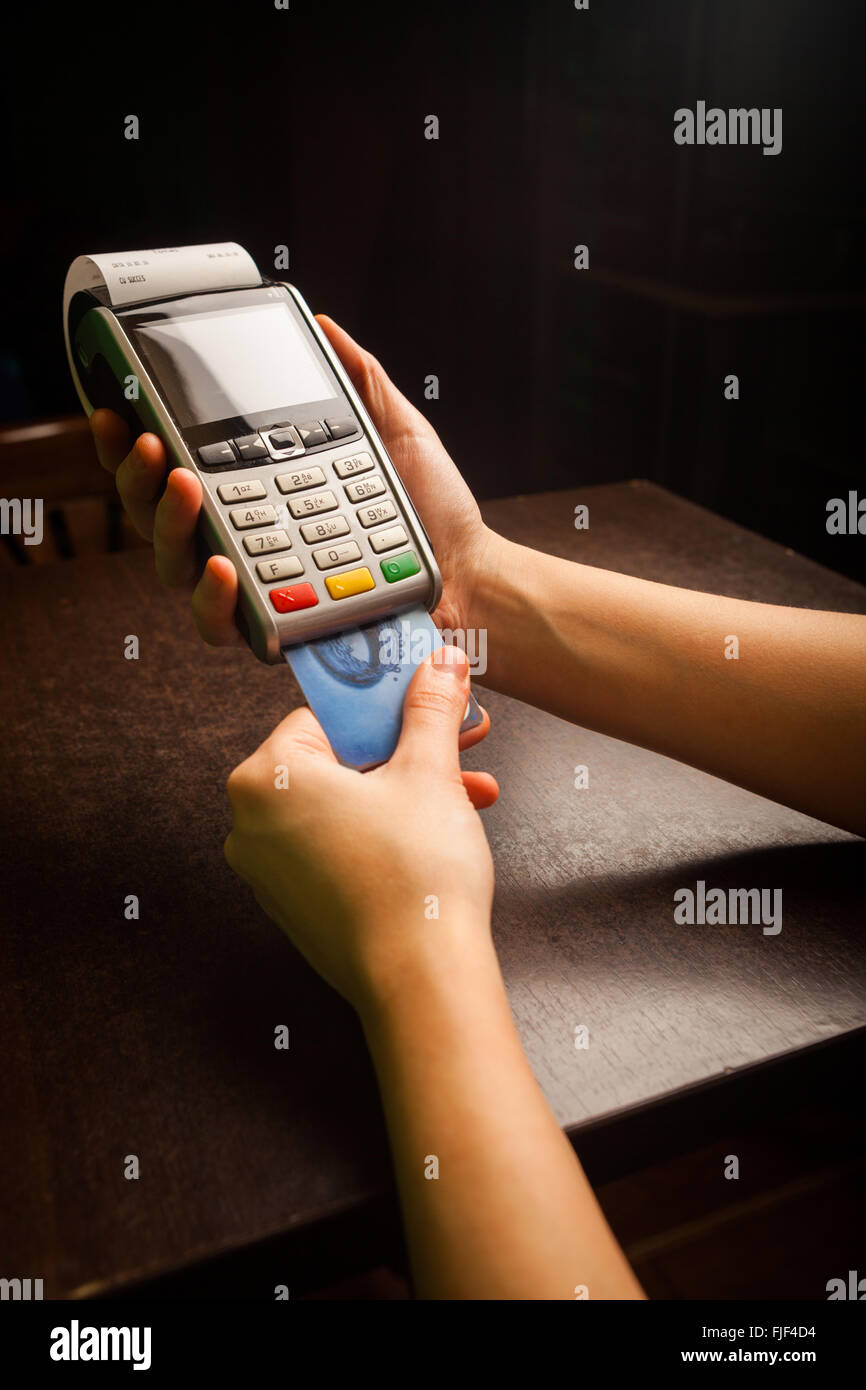 Color image of a POS and credit cards Stock Photo - Alamy
