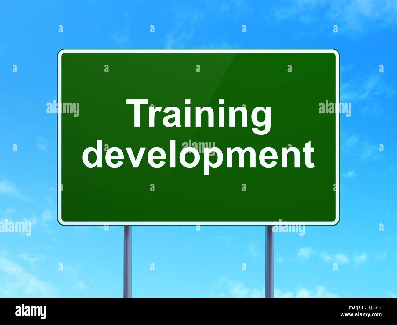 Education concept: Training Development on road sign background Stock ...