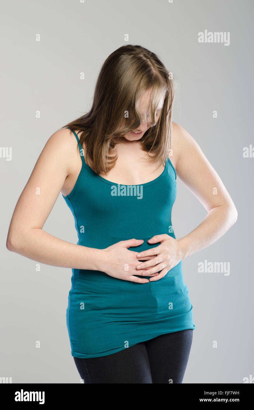 Happy woman hands on belly Stock Photo