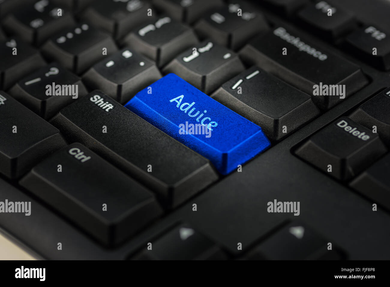 Close-up view on conceptual keyboard - advice(blue key Stock Photo - Alamy