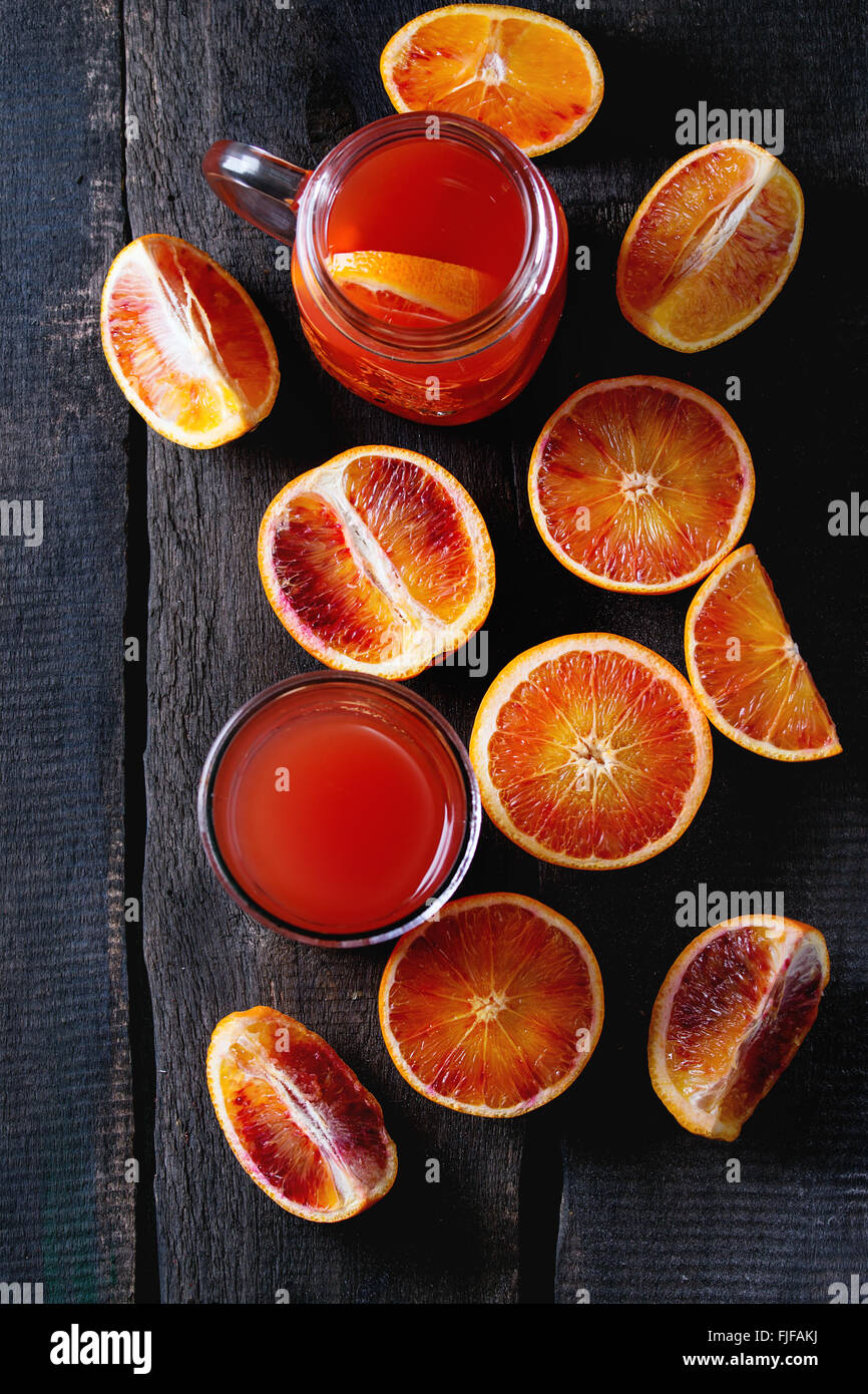 Blood oranges with juice Stock Photo Alamy