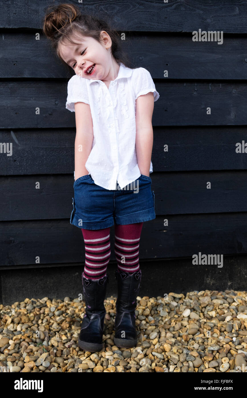 4-Year old girl wearing denim shorts over wool tights Stock Photo - Alamy