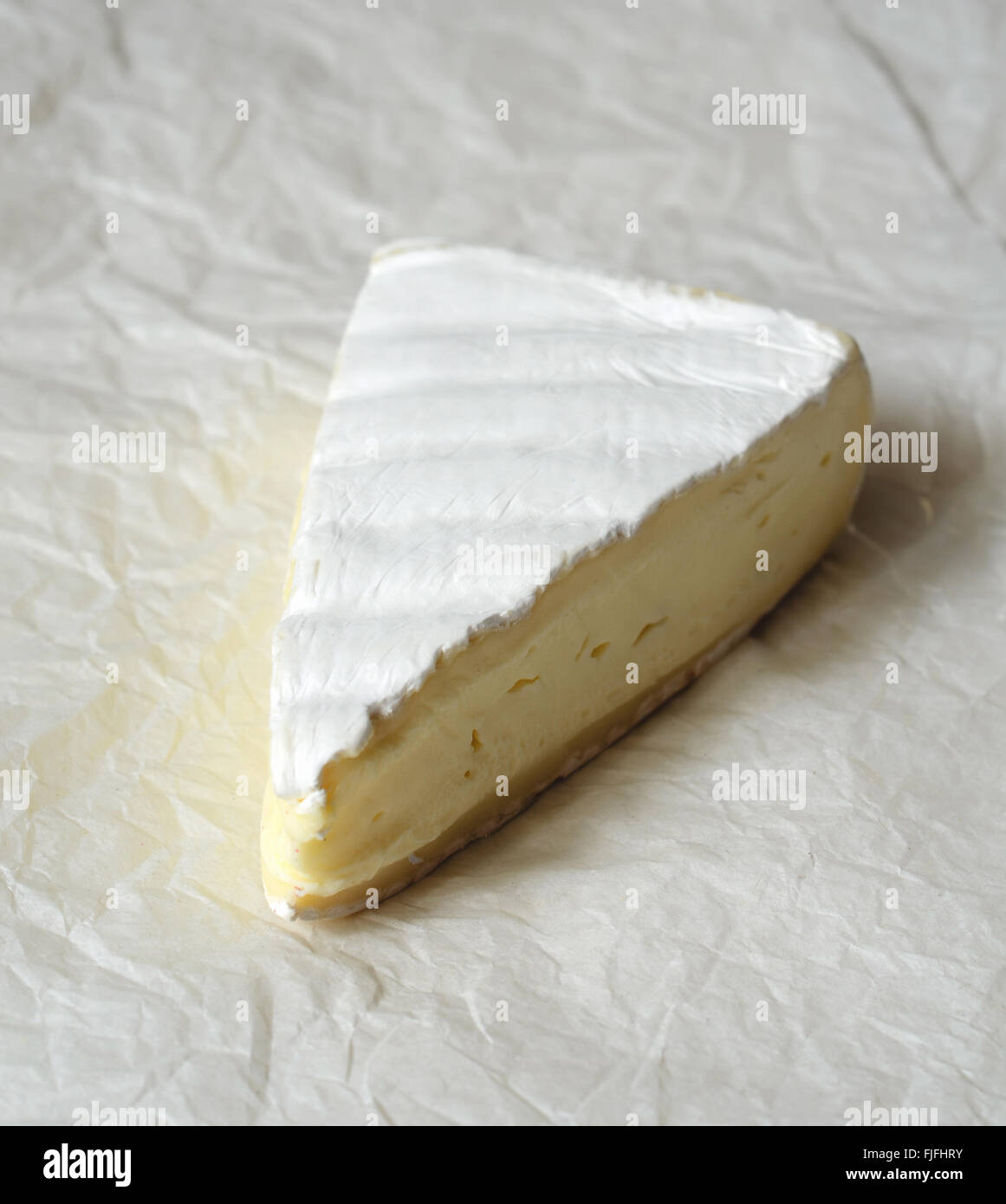 A Slice of Fresh Brie cheese, close up shot Stock Photo Alamy