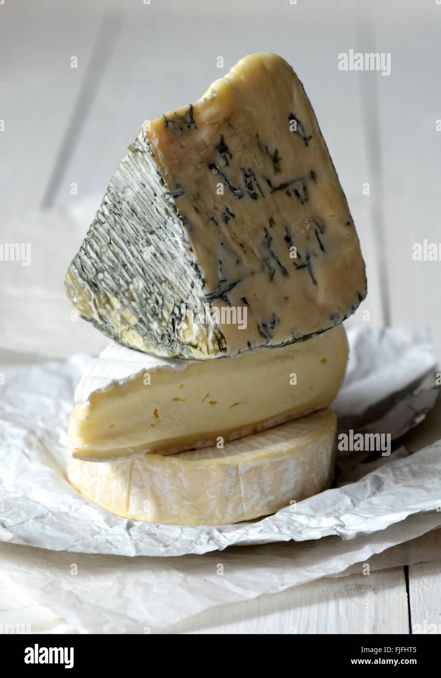 Different kinds of cheeses: camembert, brie, blue cheese Stock Photo