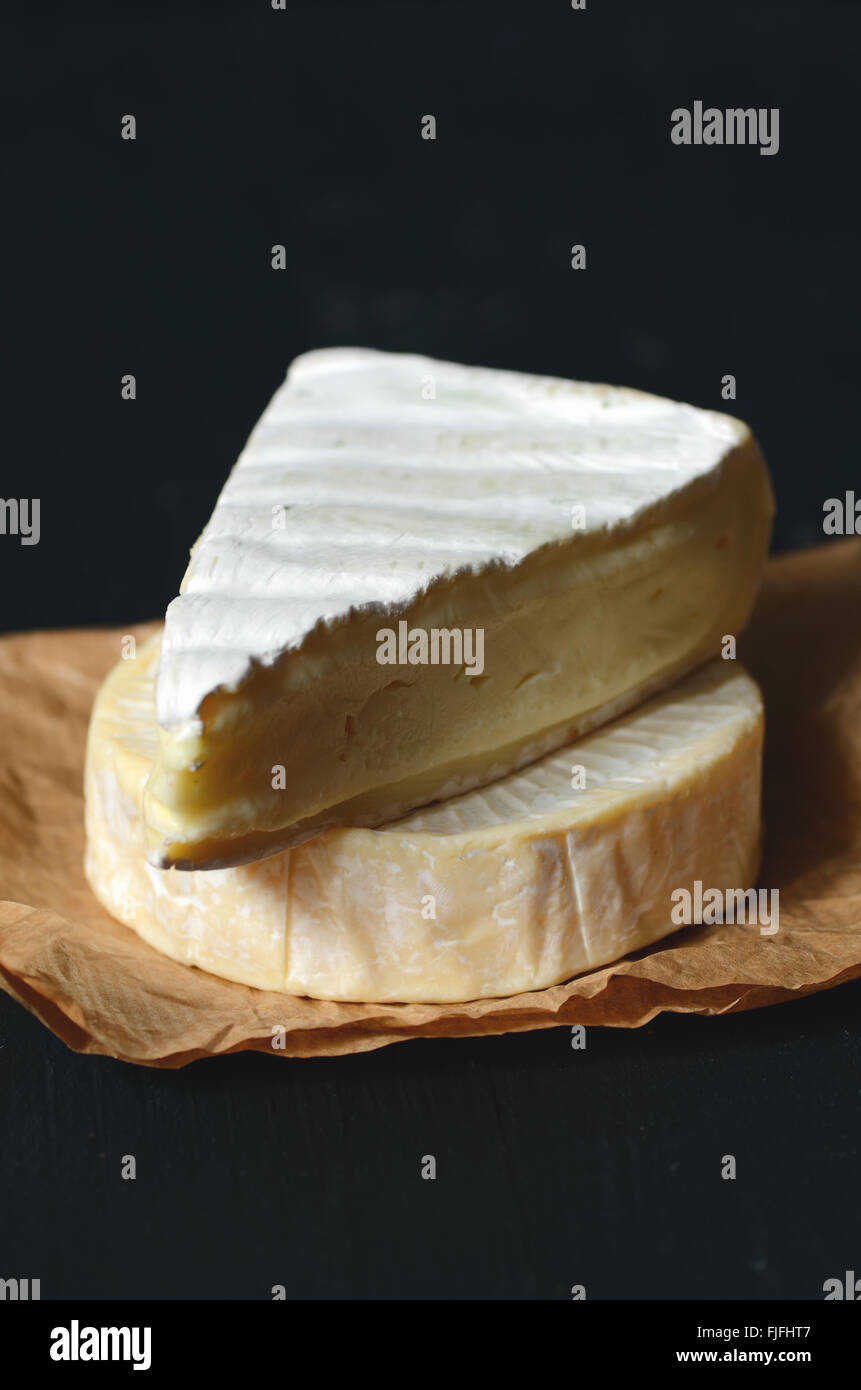 A Slice of Fresh Brie cheese, close up shot Stock Photo Alamy