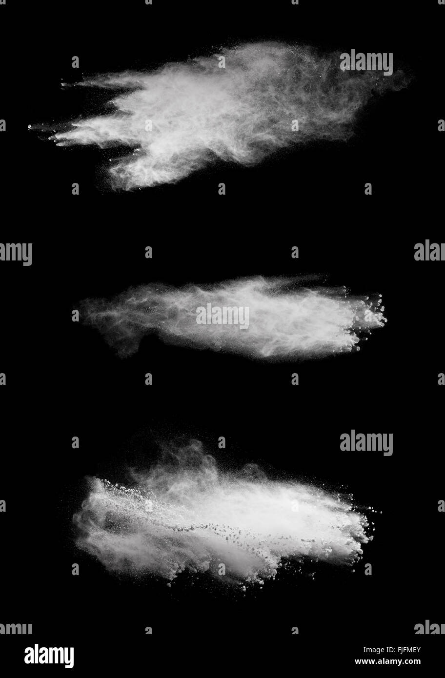 White powder explosion isolated on black background Stock Photo - Alamy