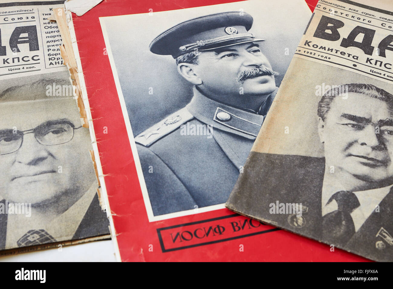 Mourning portraits of Stalin, Brezhnev and Andropov in old Soviet periodicals with news of the death of the leaders Stock Photo