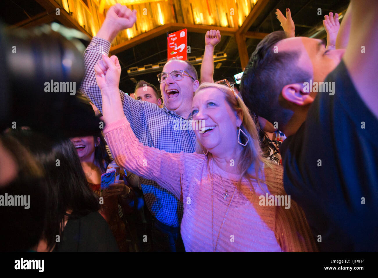 Supporters cheer as Republican presidential hopeful Ted Cruz savors a decisive victory in the Texas primary election. Stock Photo