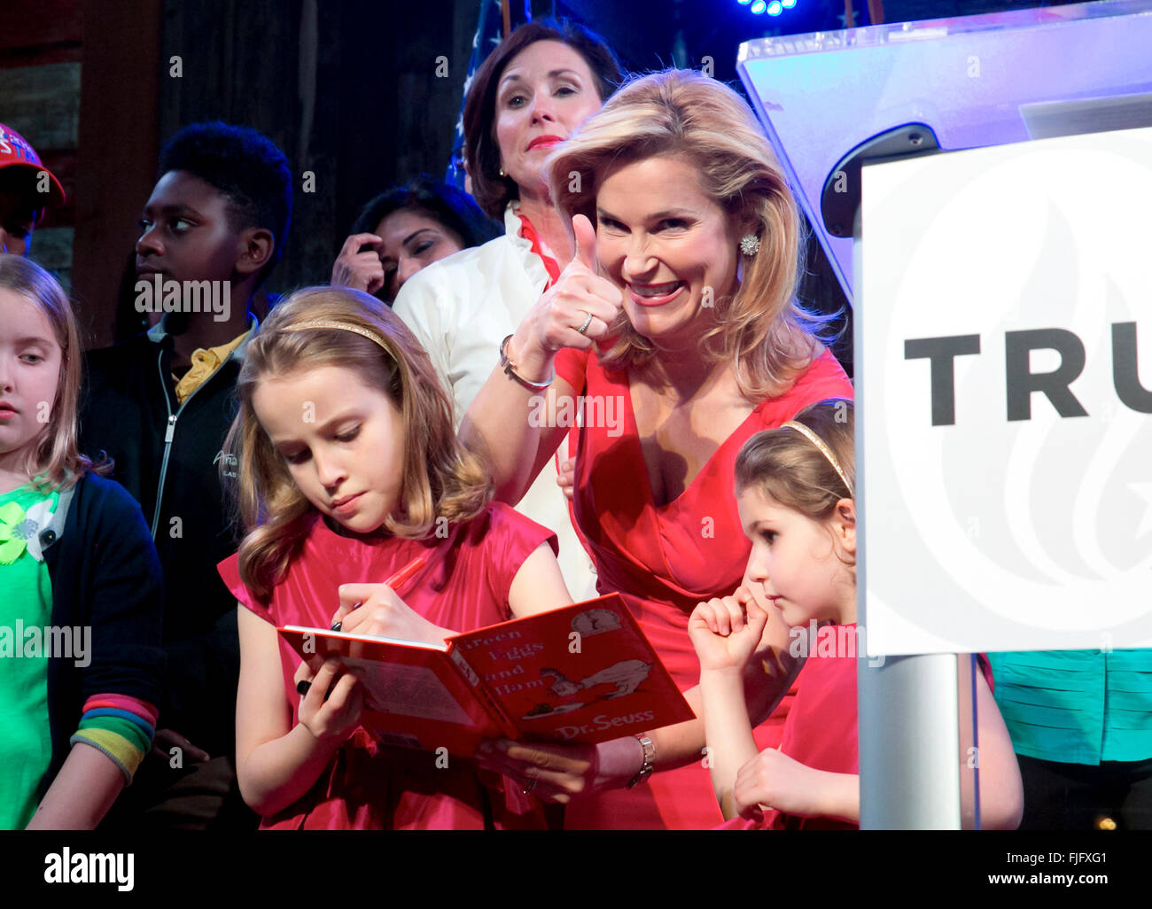 Republican presidential nominee candidate Ted Cruz's wife and daughters savor win in Texas primary from stage in Stafford TX Stock Photo