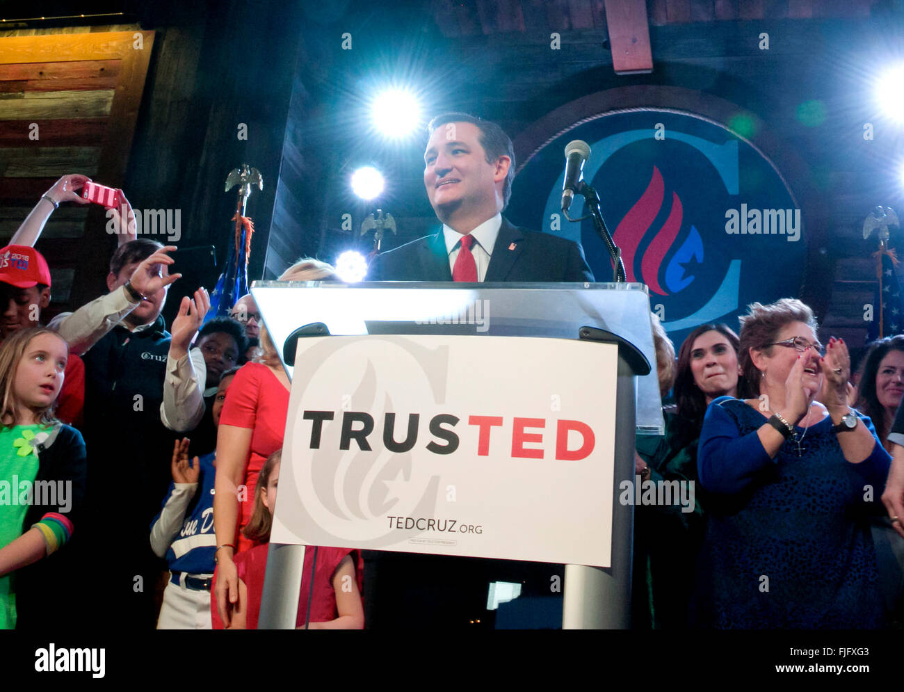 Republican presidential nominee candidate Ted Cruz savors victory in Texas primary on Super Tuesday from stage in Stafford TX Stock Photo