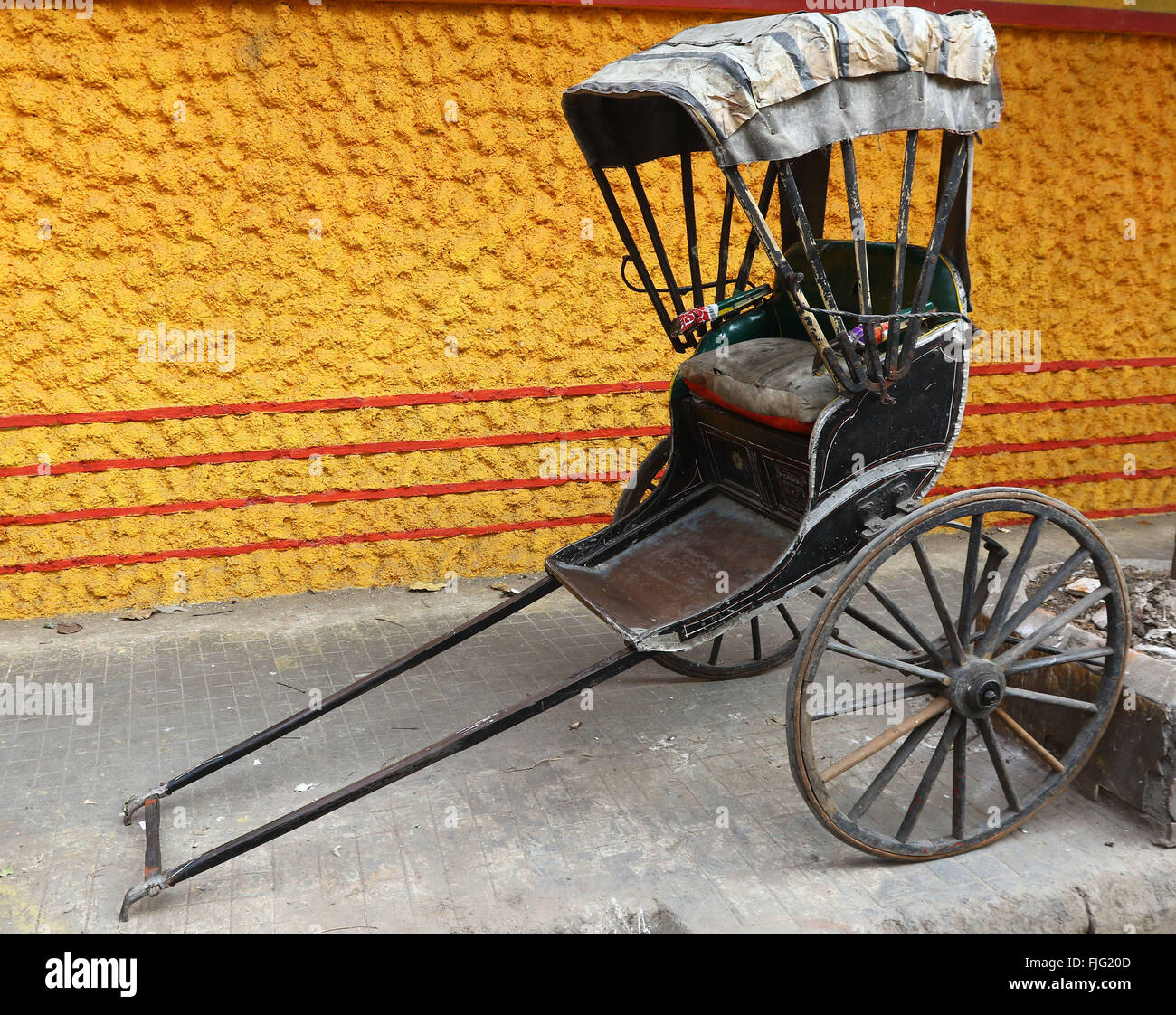 India, 20 February 2016. A hand-pulled rickshaw stands Kolkata. Photo by Palash Khan Stock Photo