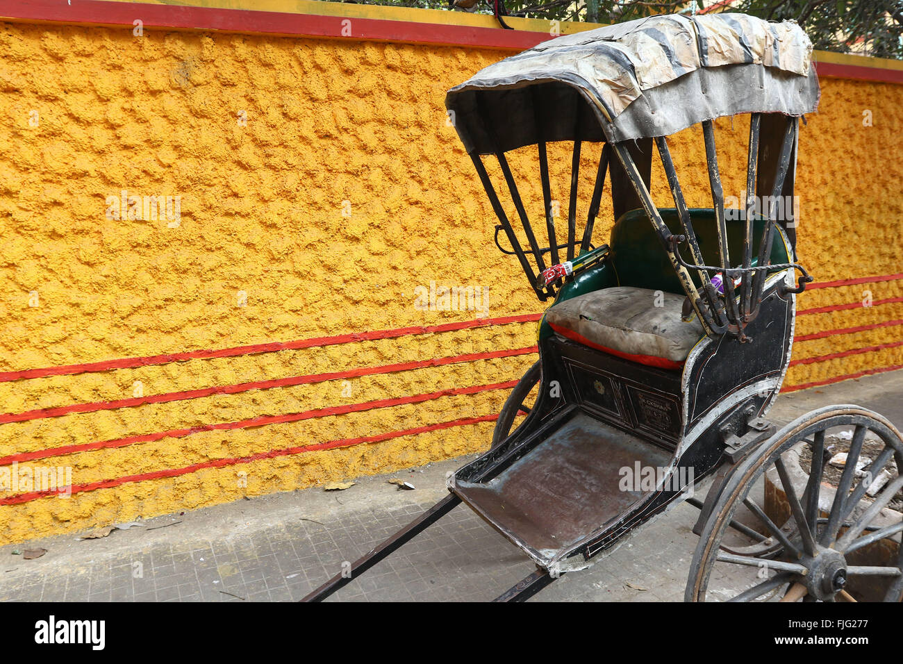India, 20 February 2016. A hand-pulled rickshaw stands Kolkata. Photo by Palash Khan Stock Photo