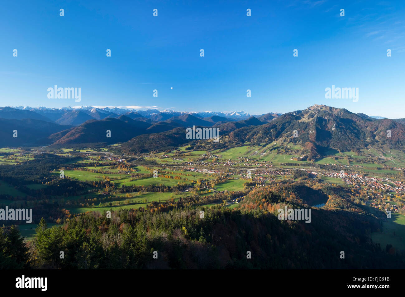 View from Geierstein mountain over the Isartal valley with Fleck and Wegscheid villages, Brauneck and Lenggries to the right Stock Photo