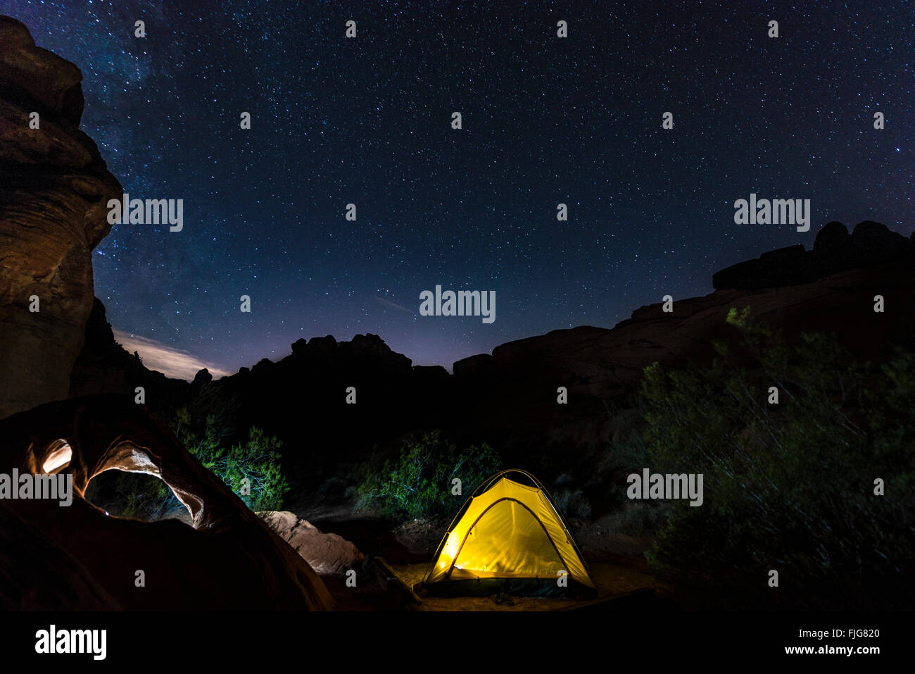Tent on a campsite with starry sky above, night scene, Wildrose Campground, Death Valley National Park, California, USA Stock Photo
