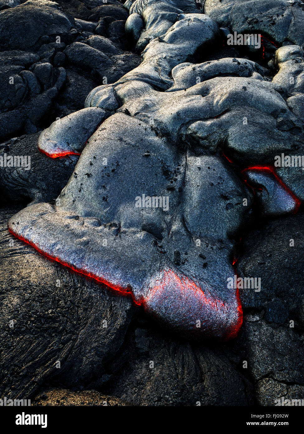 Puʻu ʻŌʻō or Puu Oo volcano, eruption, lava, glowing hot lava flows, Hawai'i Volcanoes National Park, Hawaii, USA Stock Photo
