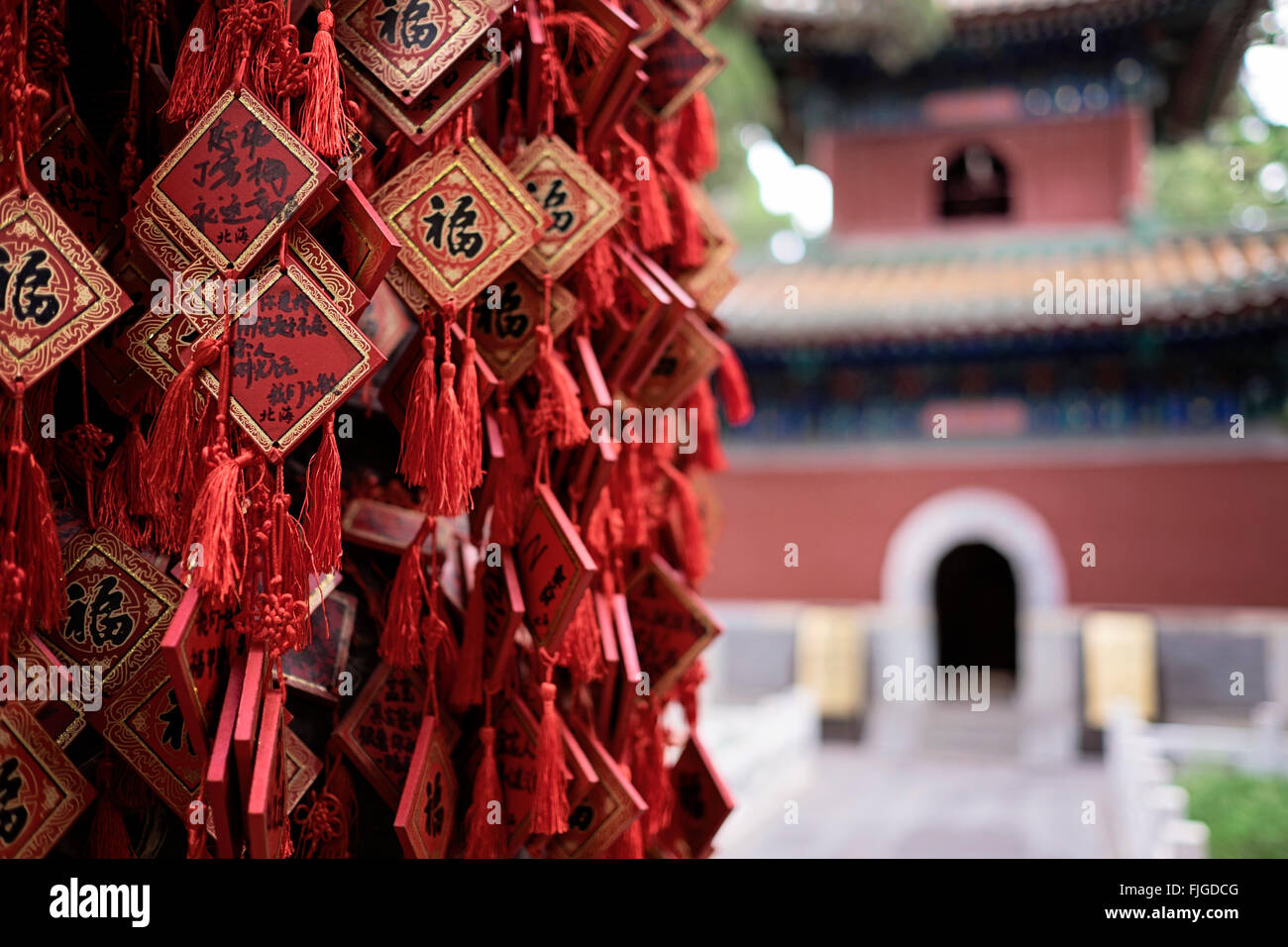 Prayers written on wooden plaques at the Temple on Jade Flower Island in Baihei Park in Beijing Stock Photo