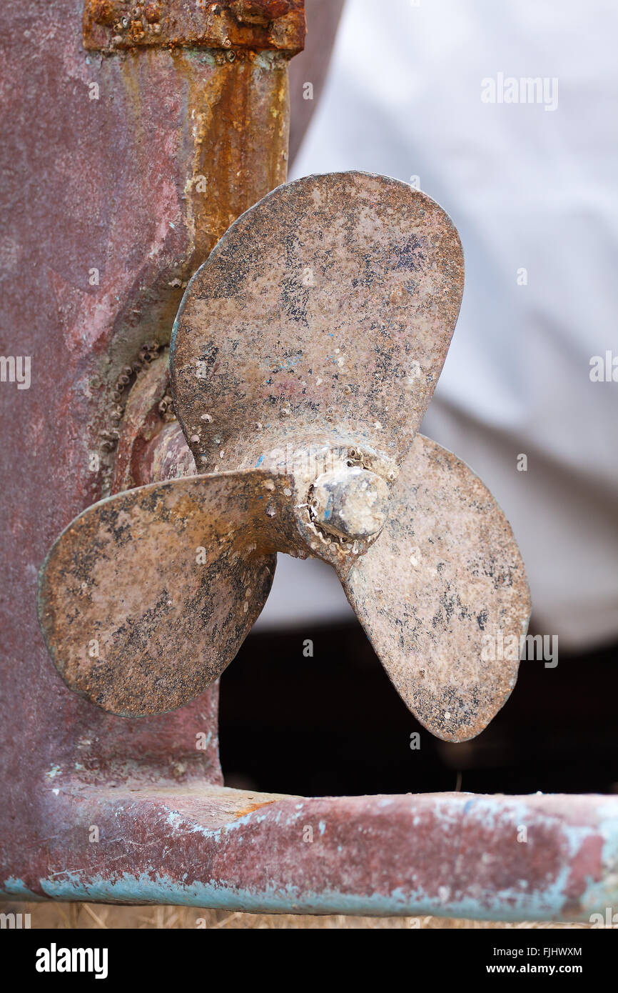 Old rusty fishing boat propeller Stock Photo