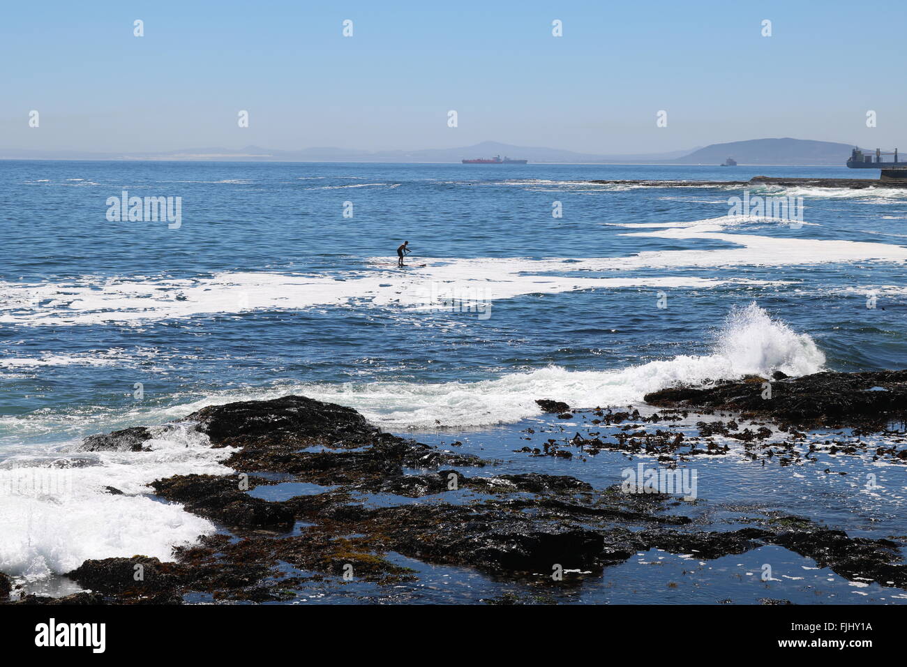 Stand up paddle boarder, Sea Point, Cape Town, South Africa Stock Photo