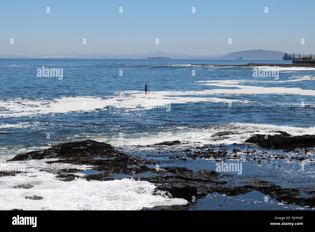 Stand up paddle boarder, Sea Point, Cape Town, South Africa Stock Photo