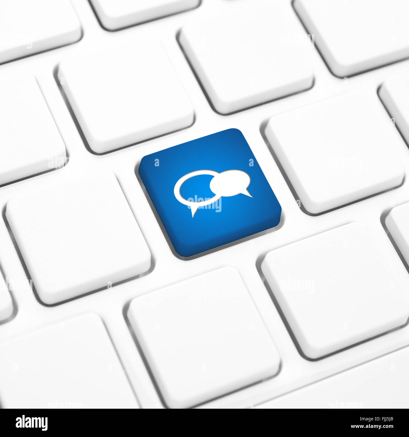 Social business concept, balloon icon, blue button or key on white keyboard. Stock Photo