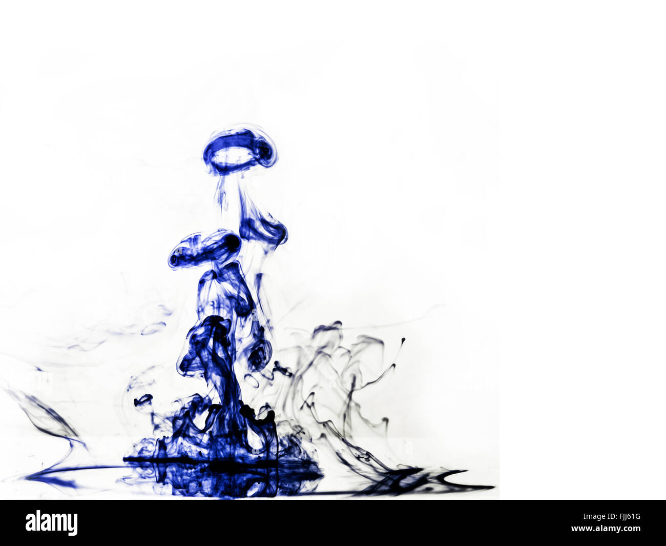 Abstract blue ink in water background Stock Photo