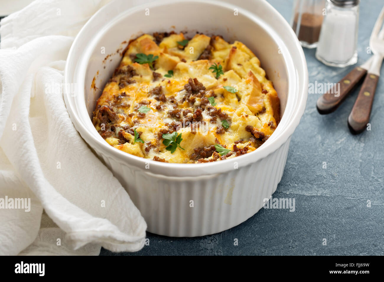 Breakfast strata with cheese and sausage Stock Photo Alamy