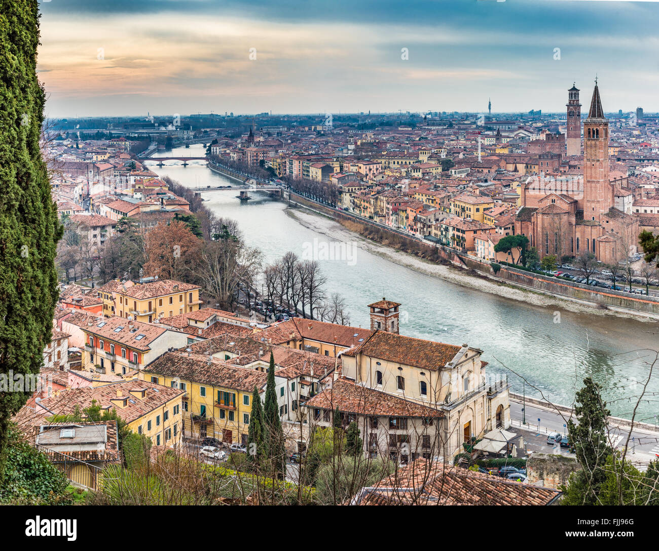 panorama of the Adige River as it passes through the houses and ...