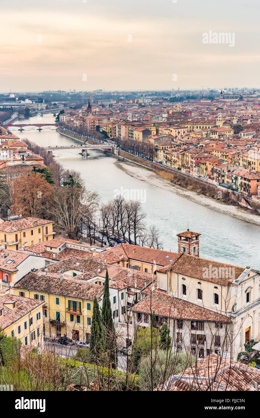 panorama of the Adige River as it passes through the houses and ...