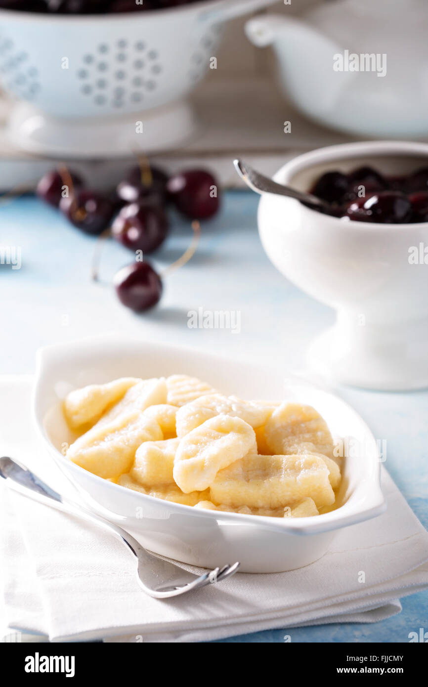 Cottage cheese gnocchi with cherry sauce Stock Photo Alamy