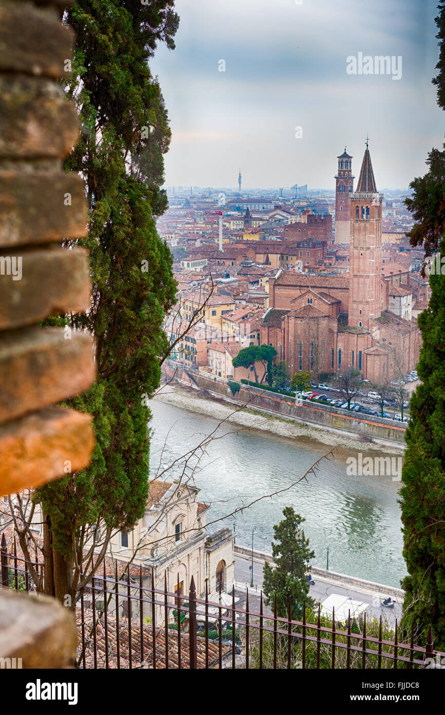 panorama of the Adige River as it passes through the houses and ...