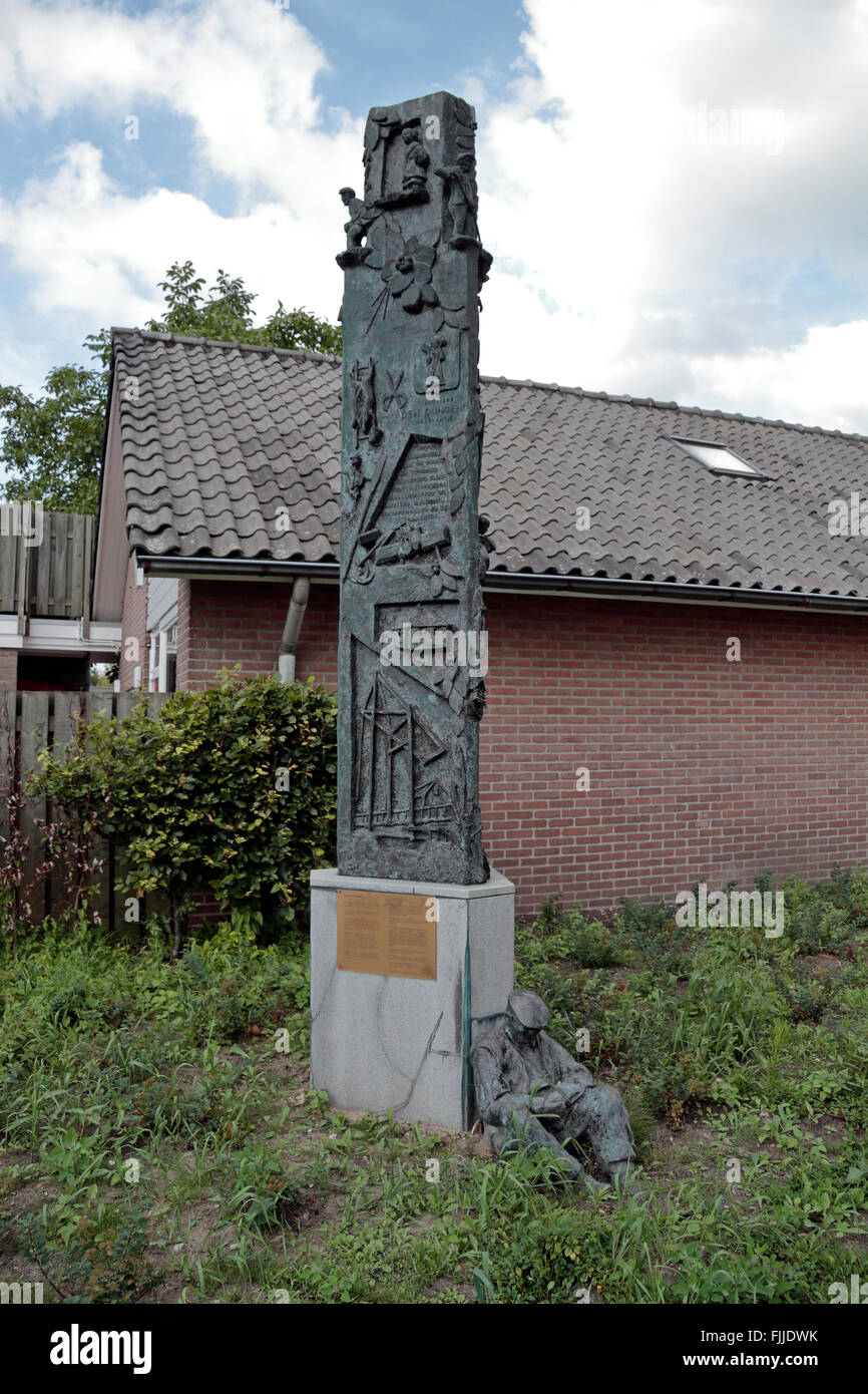 Three sided column memorial marking the end of an independent Den Dungen in 1995 with a memorial to the areas history. Stock Photo